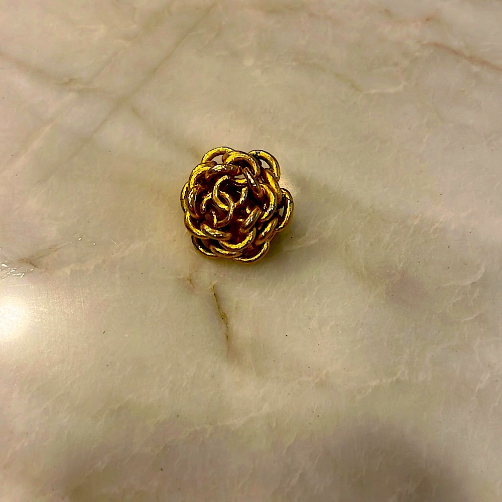 ONE CHANEL clip on earring.  Genuine CHANEL